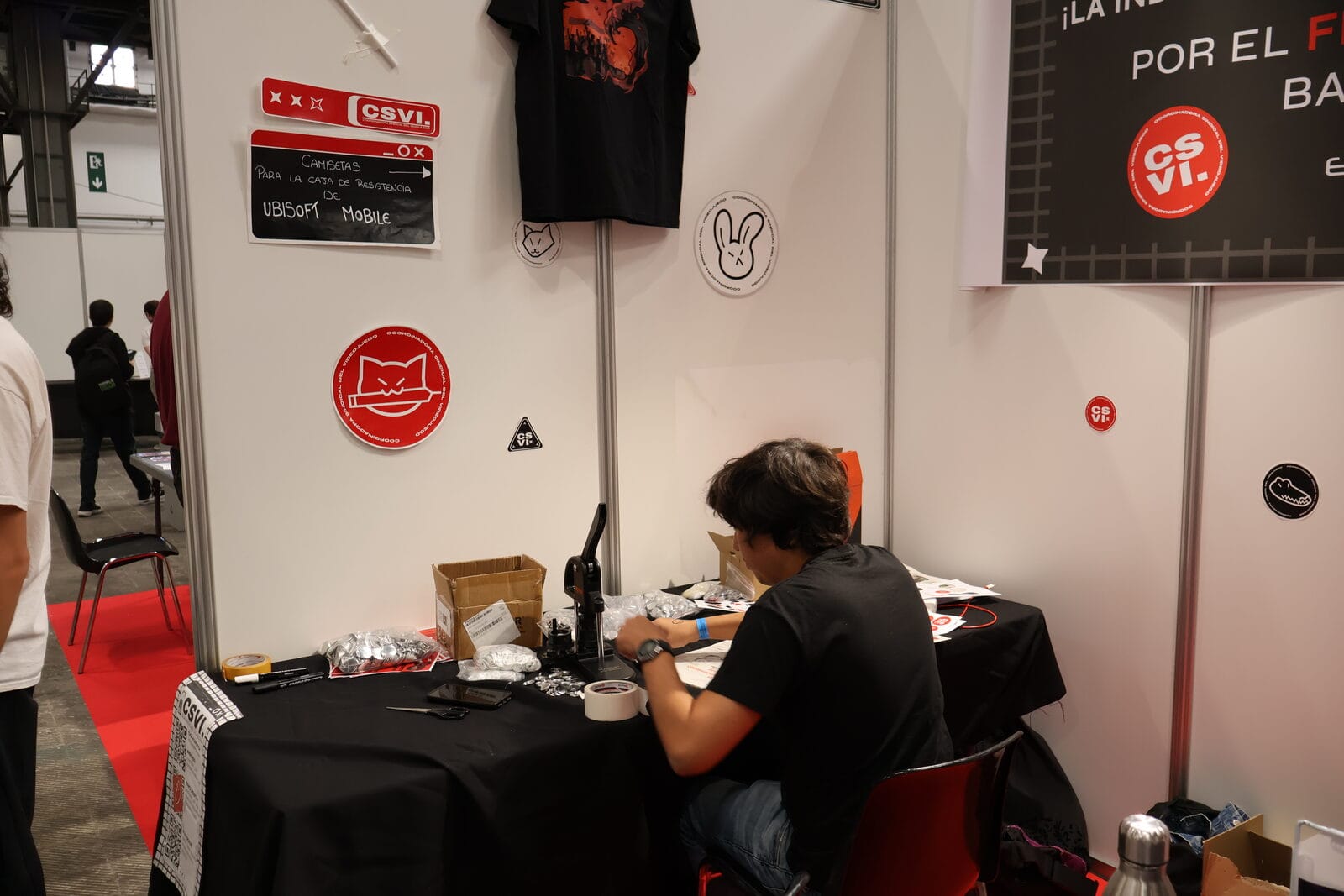 Man sitting at a table on the CSVI union stand