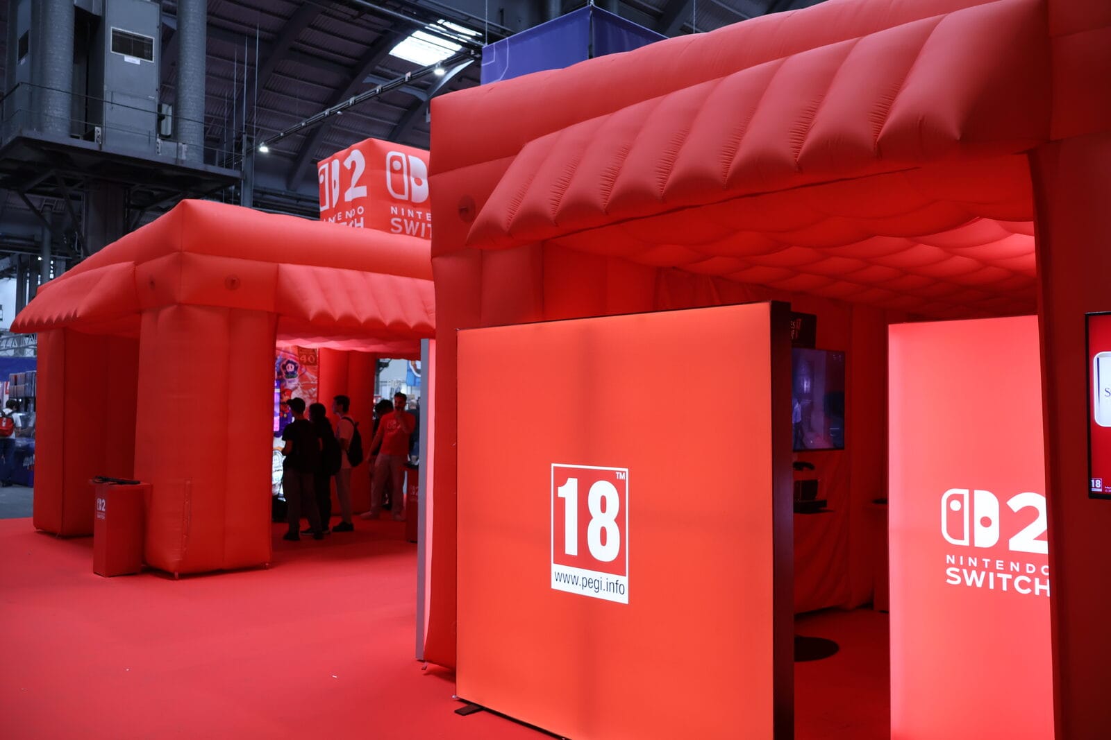 Nintendo Switch 2 branding on the red inflatable stand