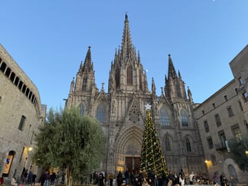 Christmas lights hanging above a street in Barcelona city centre during the festive season.