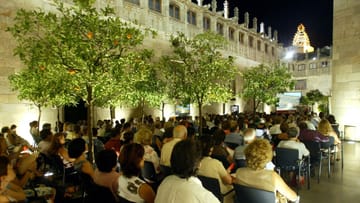 The Pati dels Tarongers at the Palau de la Generalitat in Barcelona during a carillon concert in the Barri Gòtic.