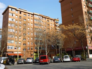 A Mossos d'Esquadra police vehicle on a street in Sant Martí, Barcelona, during an investigation.