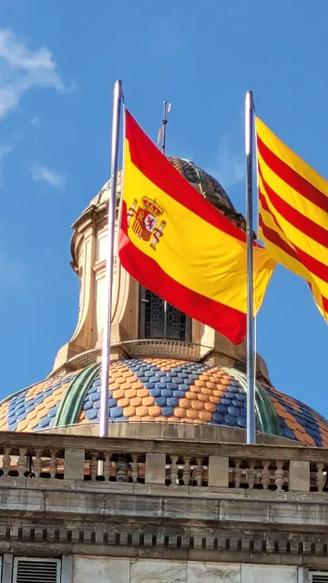 Entrance area and corridor signage at a public school in Catalonia, where signs may need updating after the Supreme Court ruling on Spanish labelling.