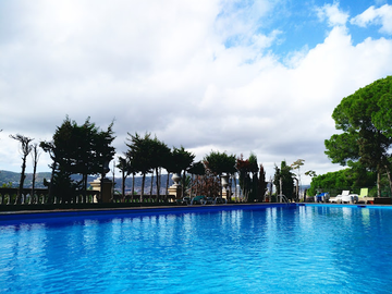 The outdoor swimming pool at Reial Societat Tennis Pompeia on Carrer de la Foixarda in Montjuïc, Barcelona.
