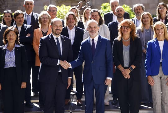Mayor Jaume Collboni and President Salvador Illa shake hands during a joint commission meeting in Barcelona
