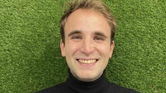 Pietro Maria Picogna, CEO of Pack, smiling in a professional setting, possibly an office or tech event.