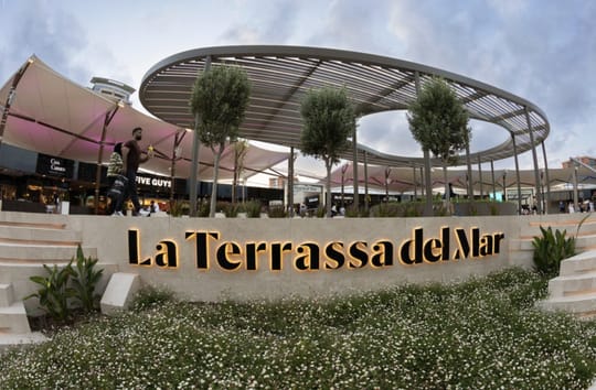 Exterior view of Diagonal Mar shopping centre in Barcelona, showing its modern architecture and entrance.