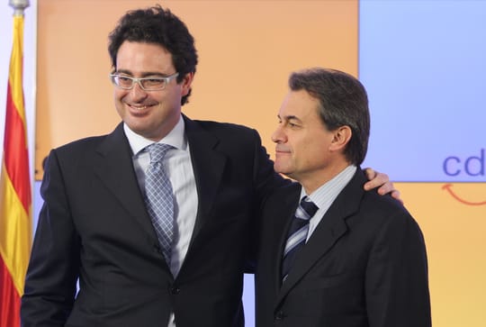 Portrait of David Madí, former CDC leader, speaking at a public event in Barcelona.