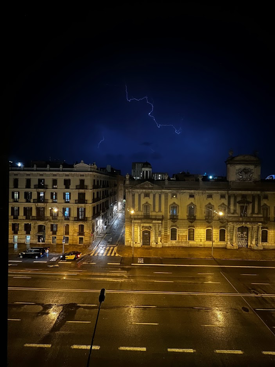 Dark storm clouds gather over eastern Spain during a period of intense summer heat.