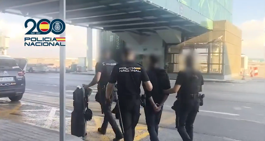 Twenty-six compact white packages seized during a cocaine inspection at Josep Tarradellas Barcelona-El Prat Airport.
