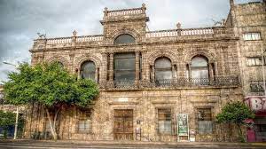 A view of the modernist 'Casa dels Gossos' at 34-36 Carrer de Bolívar in Vallcarca, Barcelona, a building currently under discussion for potential future redevelopment.