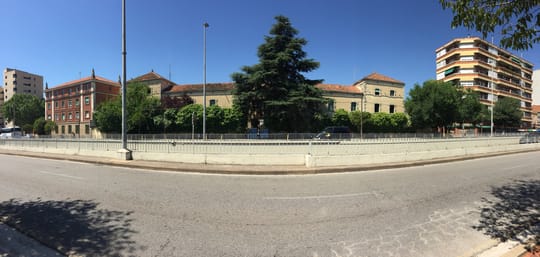Entrance courtyard of the former Civil Guard barracks in Sabadell, a large stone-built complex set to become outpatient clinics for Parc Taulí hospital.