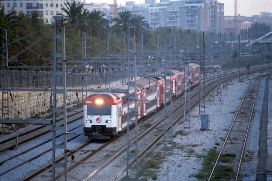 An empty metro platform at Bon Pastor station in Barcelona, showing signage for Line L9/10 Nord under morning lighting.