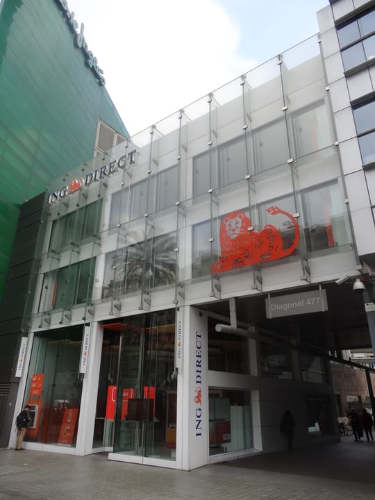 Exterior of ING Bank at Avinguda Meridiana 216 in Barcelona, a former Citroën dealership now closing after 14 years.