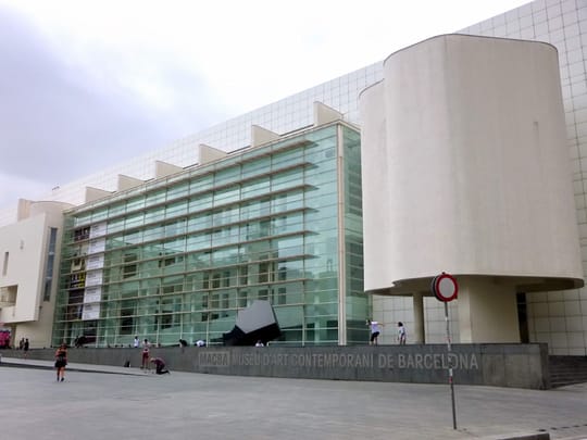 Exterior view of the MACBA Museum of Contemporary Art in Barcelona, a key site in ongoing discussions about decolonising museum collections.