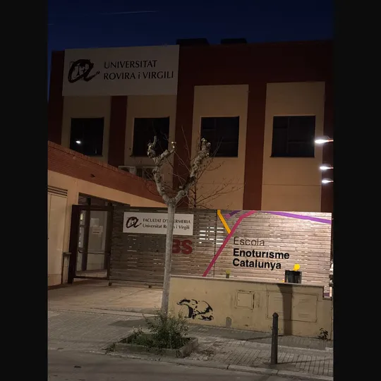 A residential street in Mira-sol, Sant Cugat, with ongoing sidewalk works and nearby construction fencing.