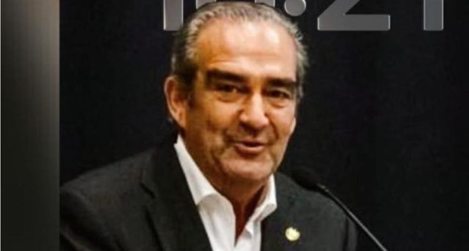 Benito Miró, El Salvador's Consul General in Barcelona, in a formal setting.