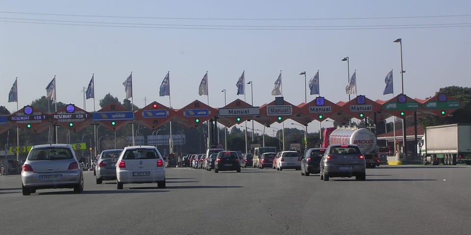 Lorries and cars travel on the AP-7 motorway in Catalonia, one of the routes being considered for a future road-use charging system.