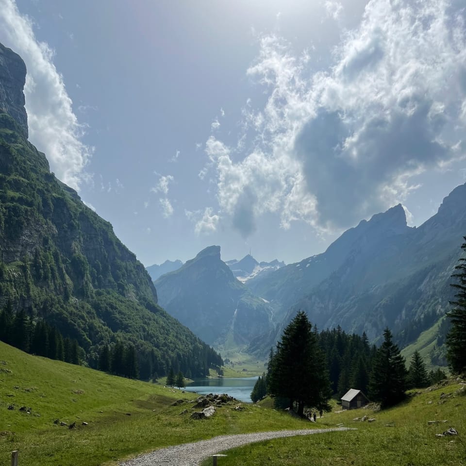 Pica d’Estats rises above a high Pyrenean lake in Alt Pirineu Natural Park.