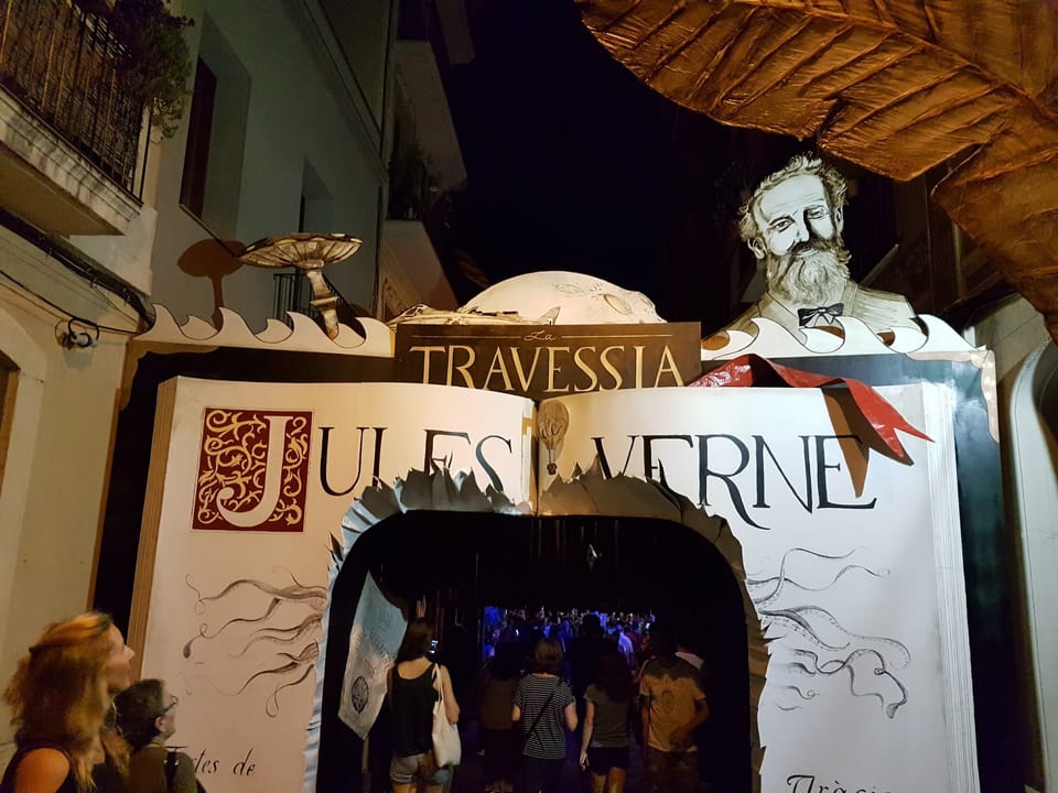 Handmade festival decorations suspended above a street in Vila de Gràcia, Barcelona, for the Festa Major de Gràcia.