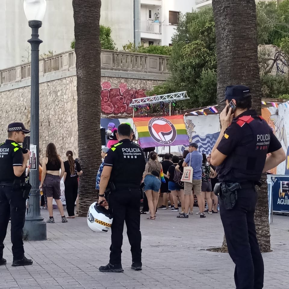 Mossos d'Esquadra patrol cars outside the police complex on Placa d'Espanya, Barcelona