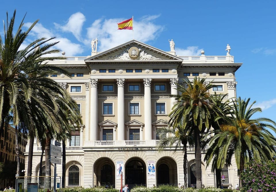 The façade of Barcelona City Hall at Plaça Sant Jaume, where the city council manages resident procedures.
