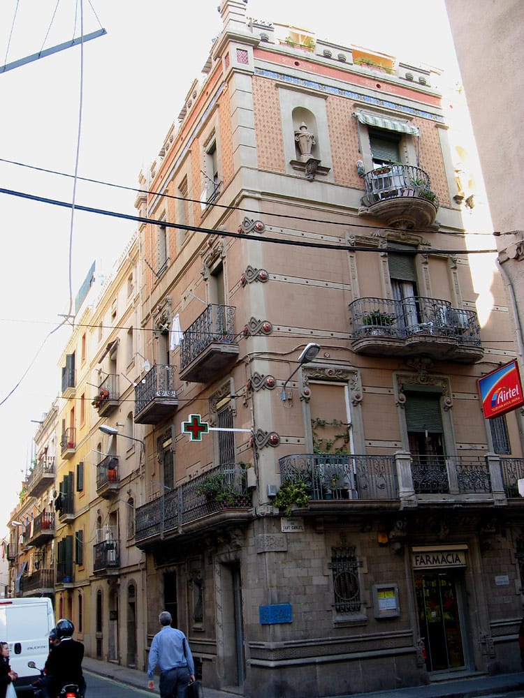 Aerial view of La Barceloneta in Barcelona showing narrow streets and dense urban layout near the seafront.