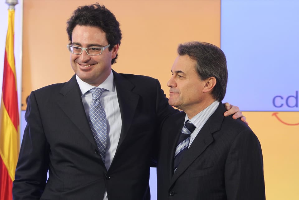 Portrait of David Madí, former CDC leader, speaking at a public event in Barcelona.