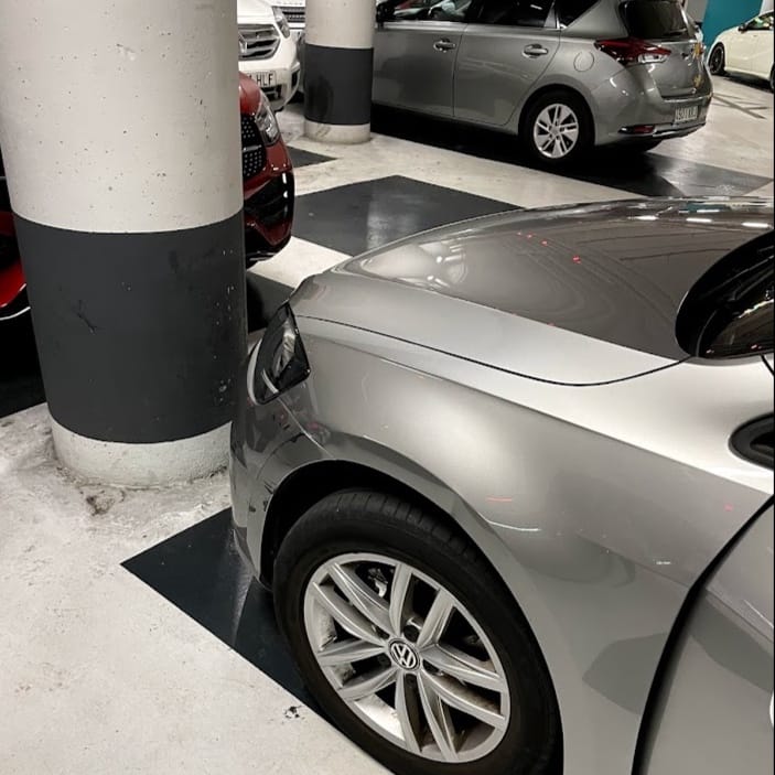 Parking spaces inside a residential building in central Barcelona, illustrating the proposed change to parking requirements for protected housing.