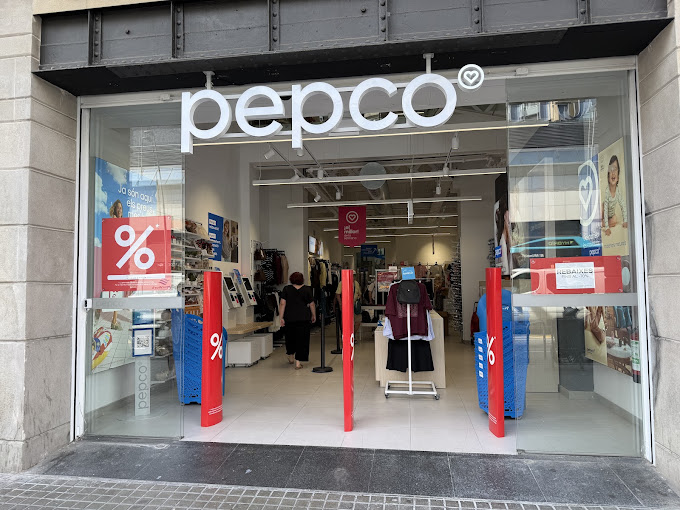 Exterior view of the new Pepco store on Pelai street in central Barcelona, showing its prominent storefront near Plaça de Catalunya.
