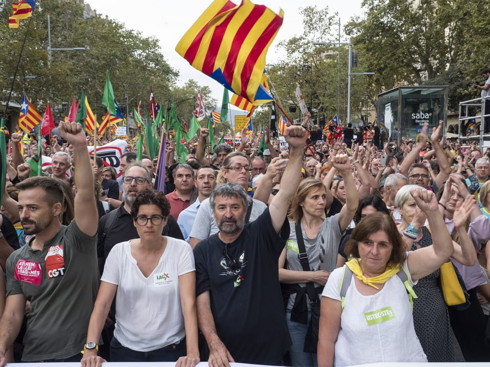 Teachers demonstrate on a street in Barcelona ahead of the planned USTEC strike on the first day of the Catalan school year.