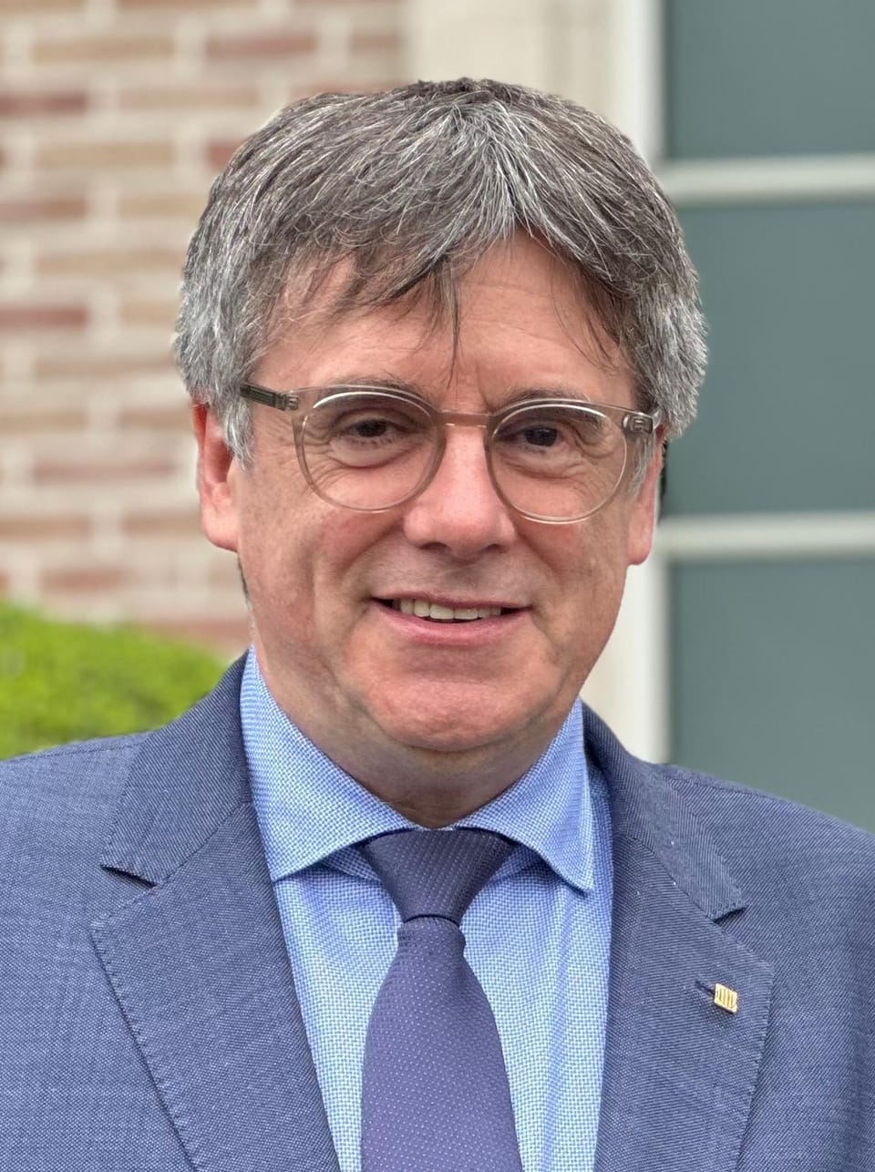 Comuns and CUP urge Puigdemont to steer Junts