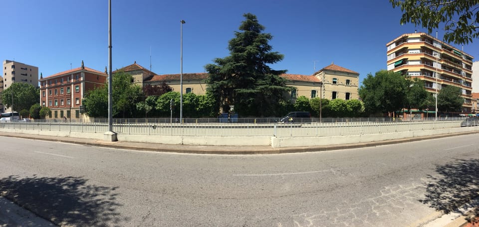 Entrance courtyard of the former Civil Guard barracks in Sabadell, a large stone-built complex set to become outpatient clinics for Parc Taulí hospital.