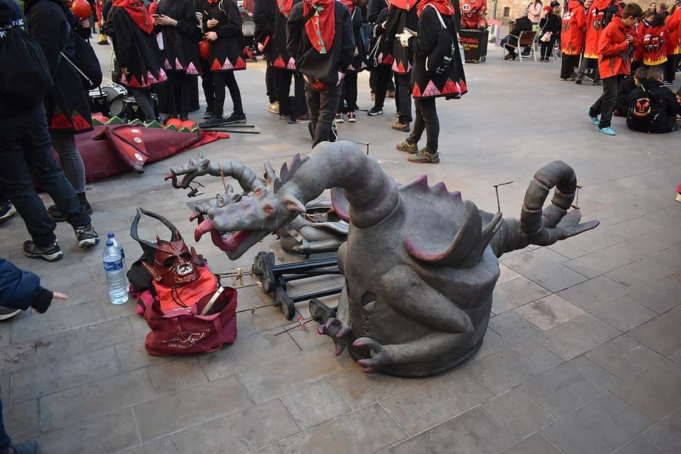 Fire-running performers in traditional costumes take part in Barcelona’s Correfoc during La Mercè celebrations.