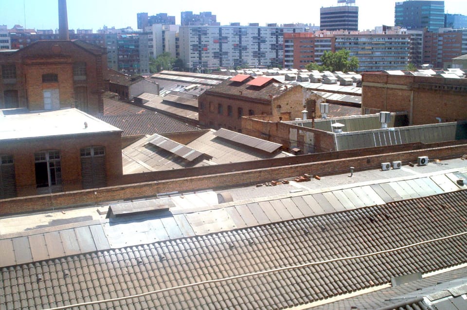 A modern apartment building in La Bordeta, Sants, part of the BeCorp rental development under scrutiny for high rental costs and tenant complaints.
