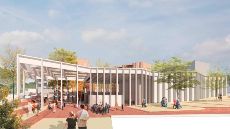 A conceptual design image showing the planned Auditorium-Theatre at Espai Labandària in Llavaneres, with modern architecture integrated into the urban streetscape near Passeig de Jaume Bruta