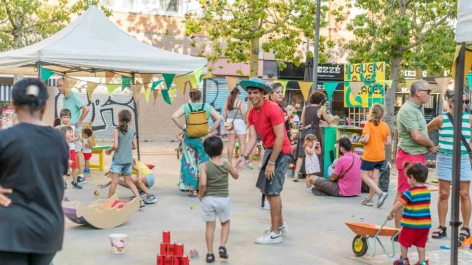 Children playing with musical instruments at an outdoor festival