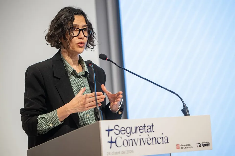 Catalonia's Interior Minister Núria Parlon speaking at a press conference about public safety and crime reduction strategies.