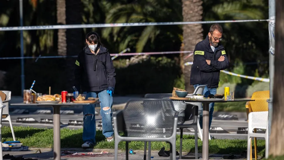 Police tape and investigation scene in Barcelona's Poblenou district following the fatal shooting of a Montenegrin fugitive