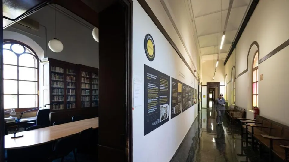 Historic building of the University of Barcelona with a banner for the Intramurs exhibition